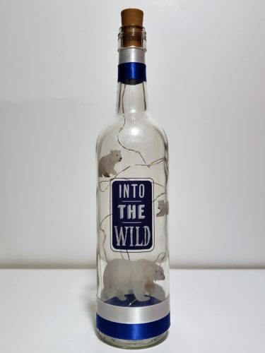 Bottle light with polar bears and the phrase, "Into the Wild".