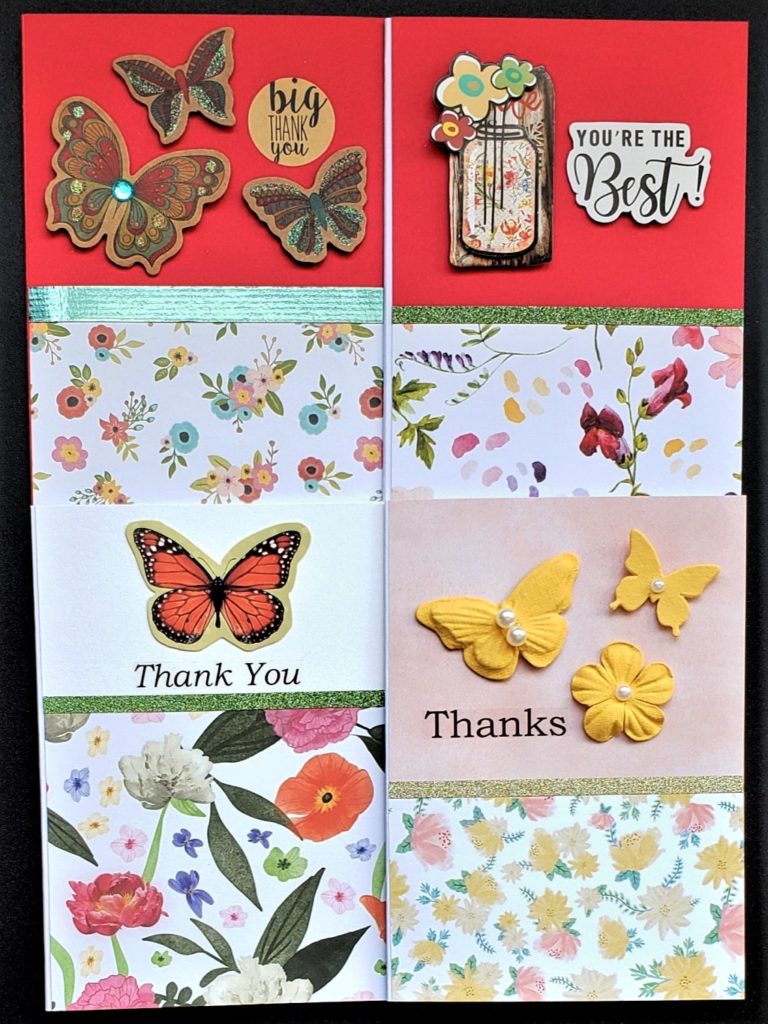 Four pack of thank you cards in red, yellow and orange florals.